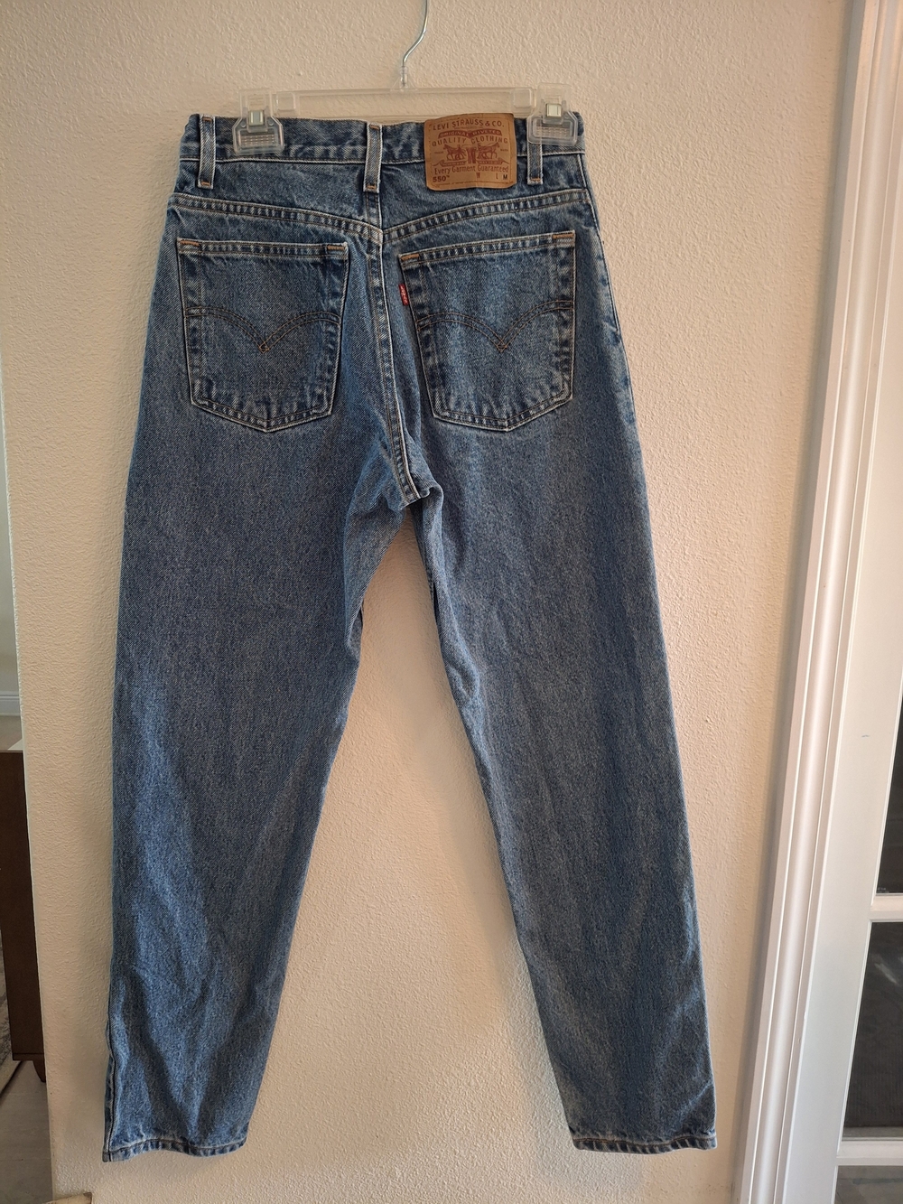 Vintage Levi's Women's Medium Blue 550 Jeans